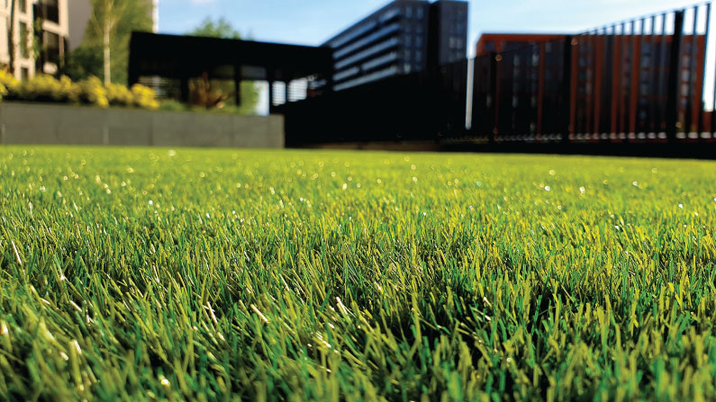 Laying artificial grass